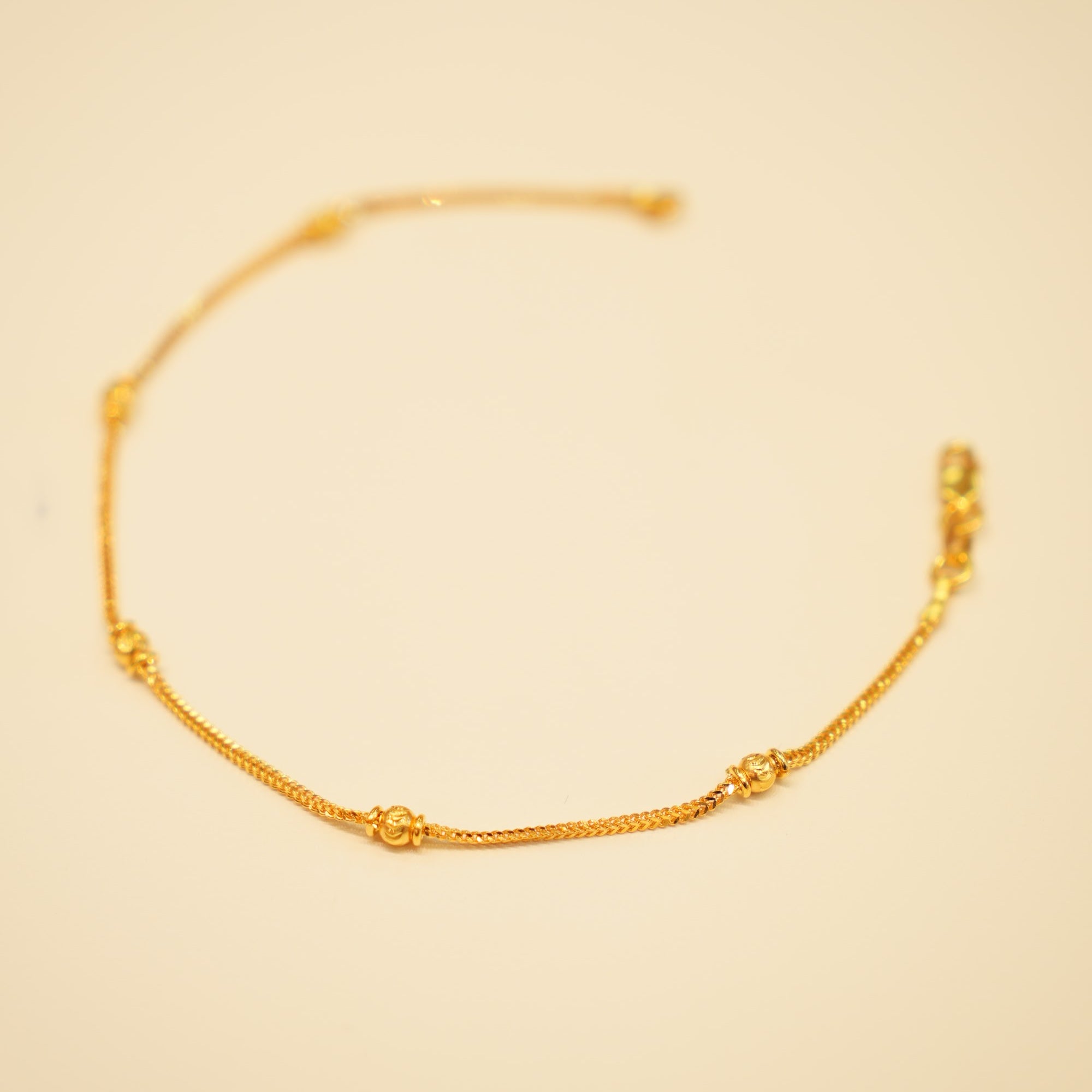 22K Gold Ridged Bead Station Bracelet