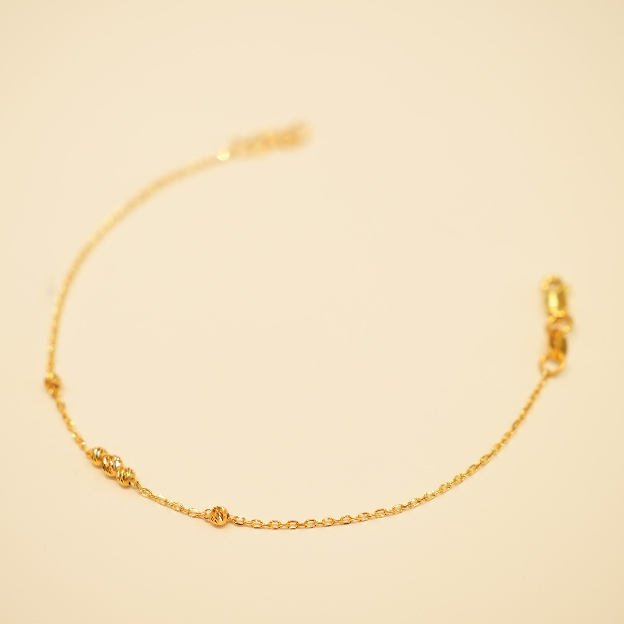 22K Gold Fine Chain Bead Station Bracelet