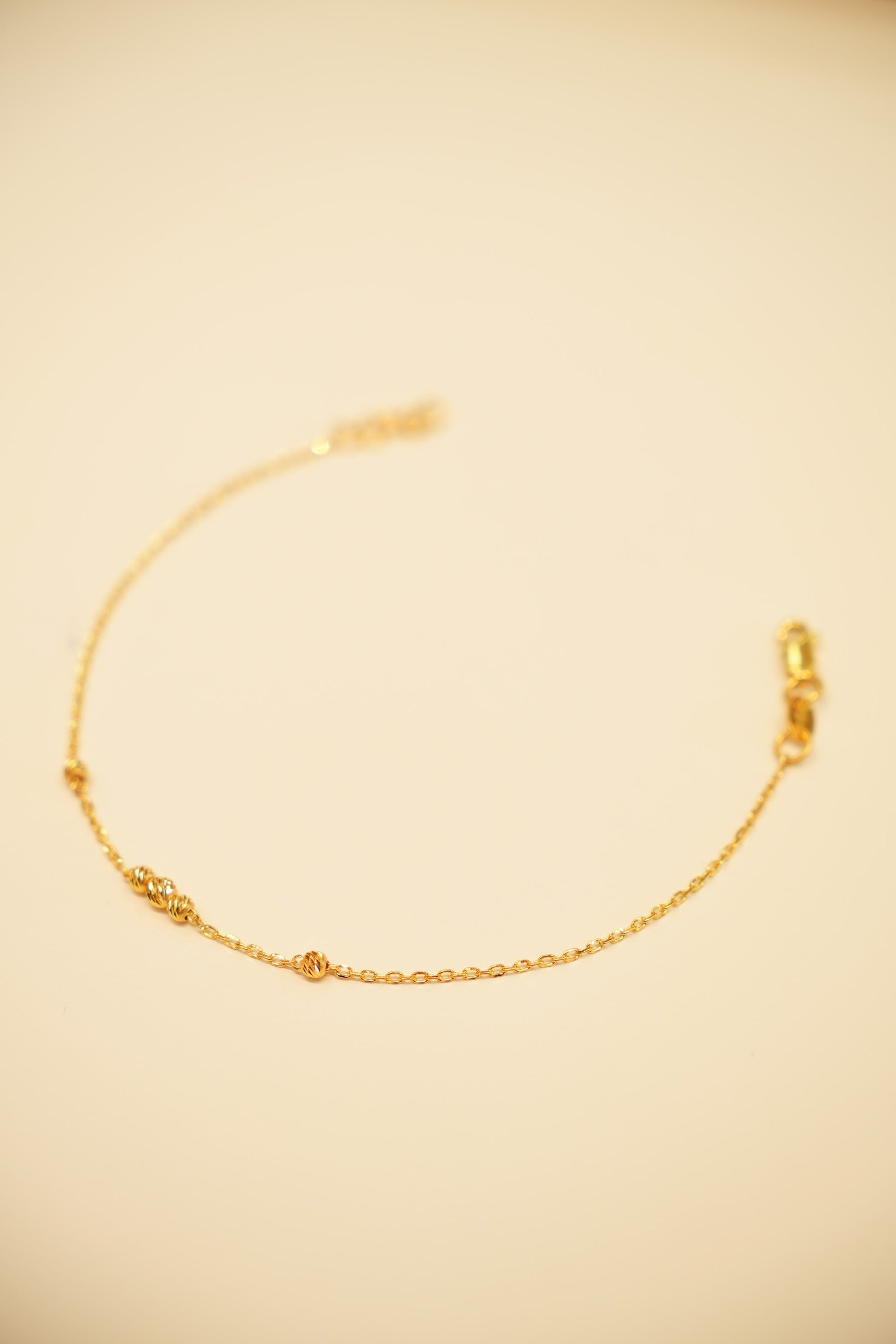 22K Gold Fine Chain Bead Station Bracelet