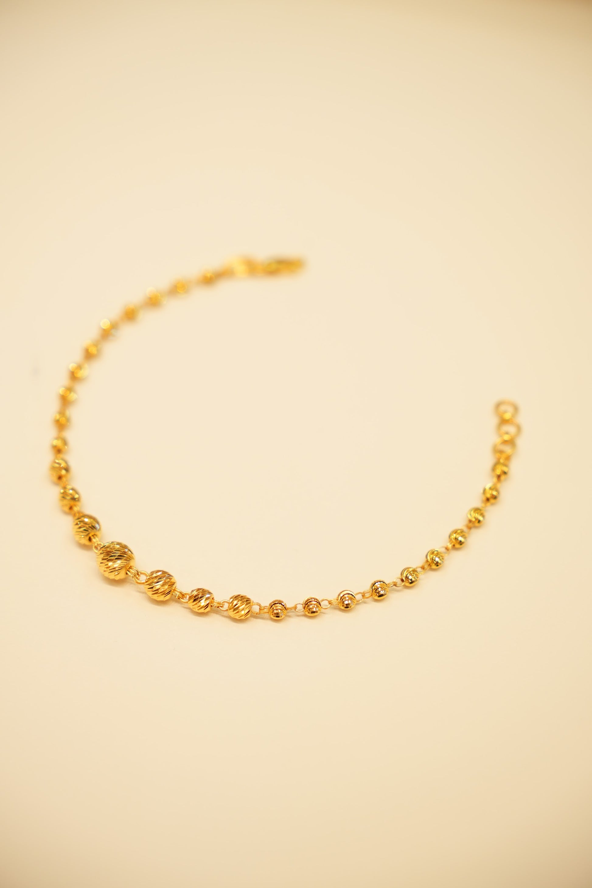 22K Gold Ridged Bead Bracelet