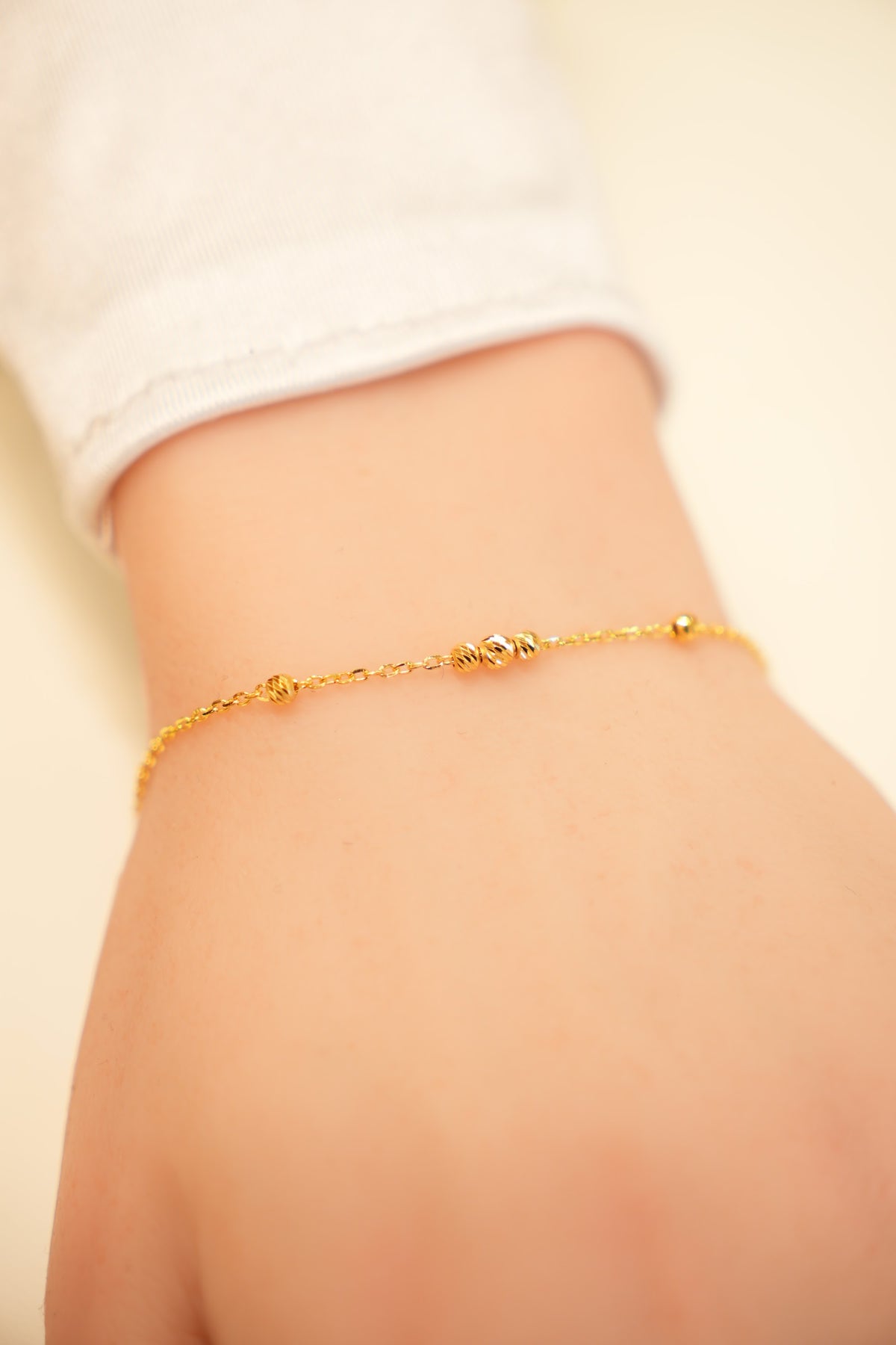 22K Gold Fine Chain Bead Station Bracelet
