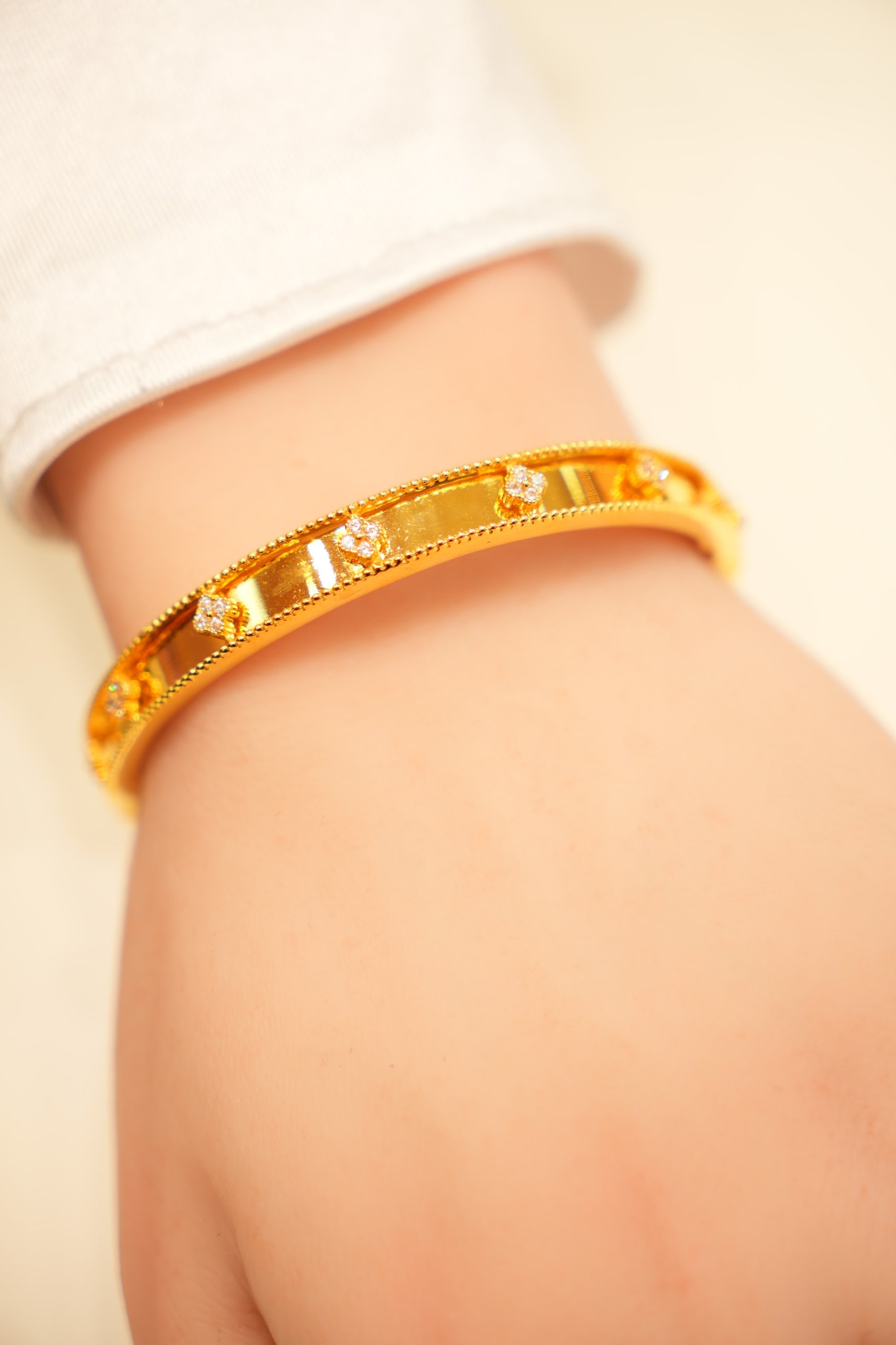 22K Gold Flower Accent Bangle Bracelet