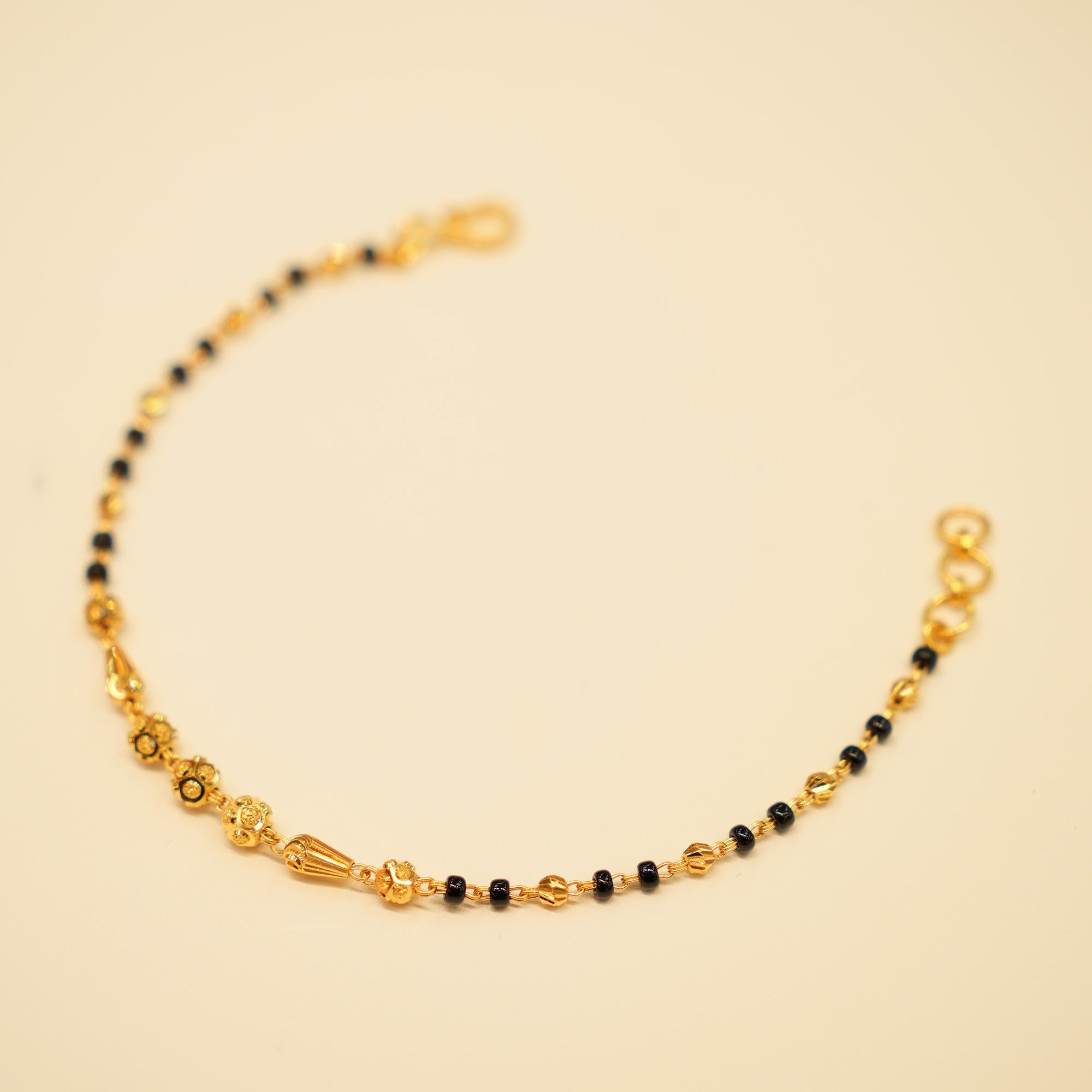 22K Gold Black Bead Floral Bracelet