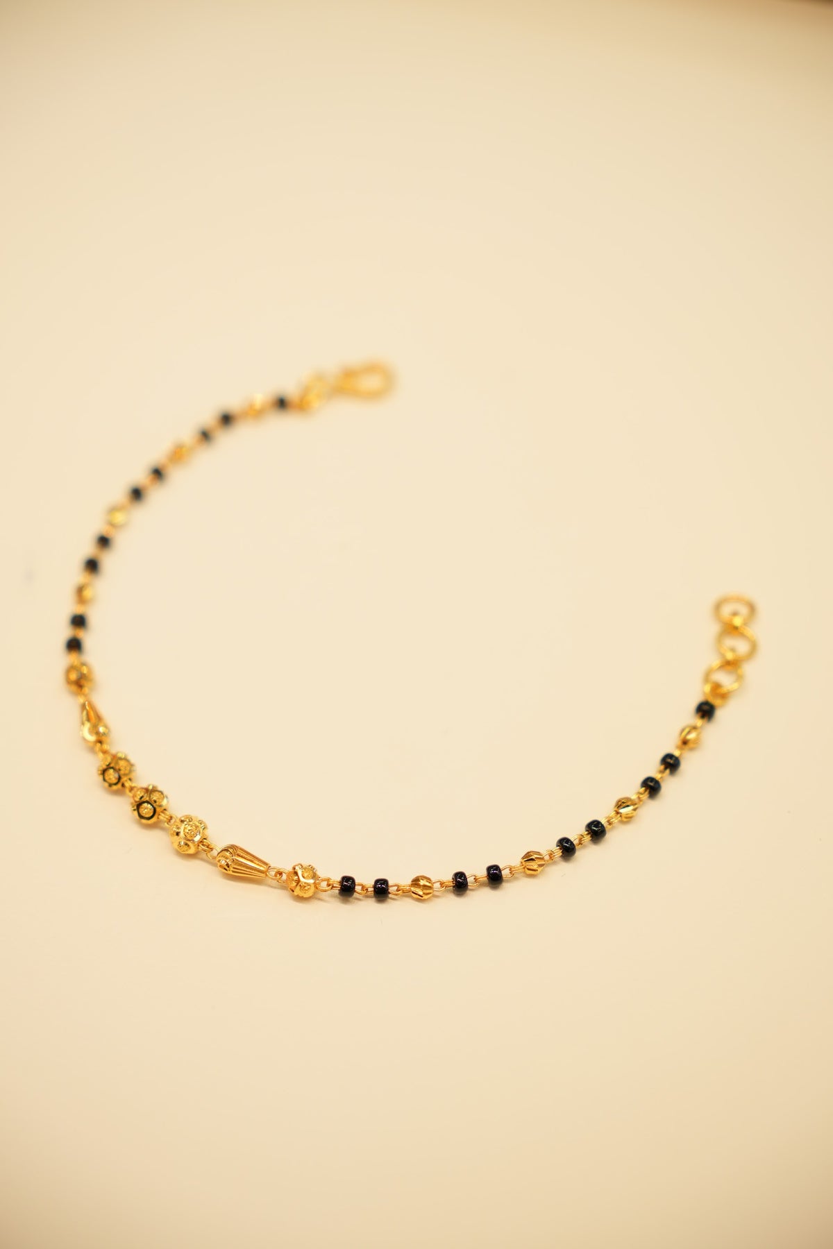 22K Gold Black Bead Floral Bracelet