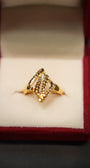 Intricate gold ring pattern