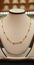 Luxury gold chain with gemstone accents