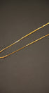 Elegant gold necklace with sparkling stones