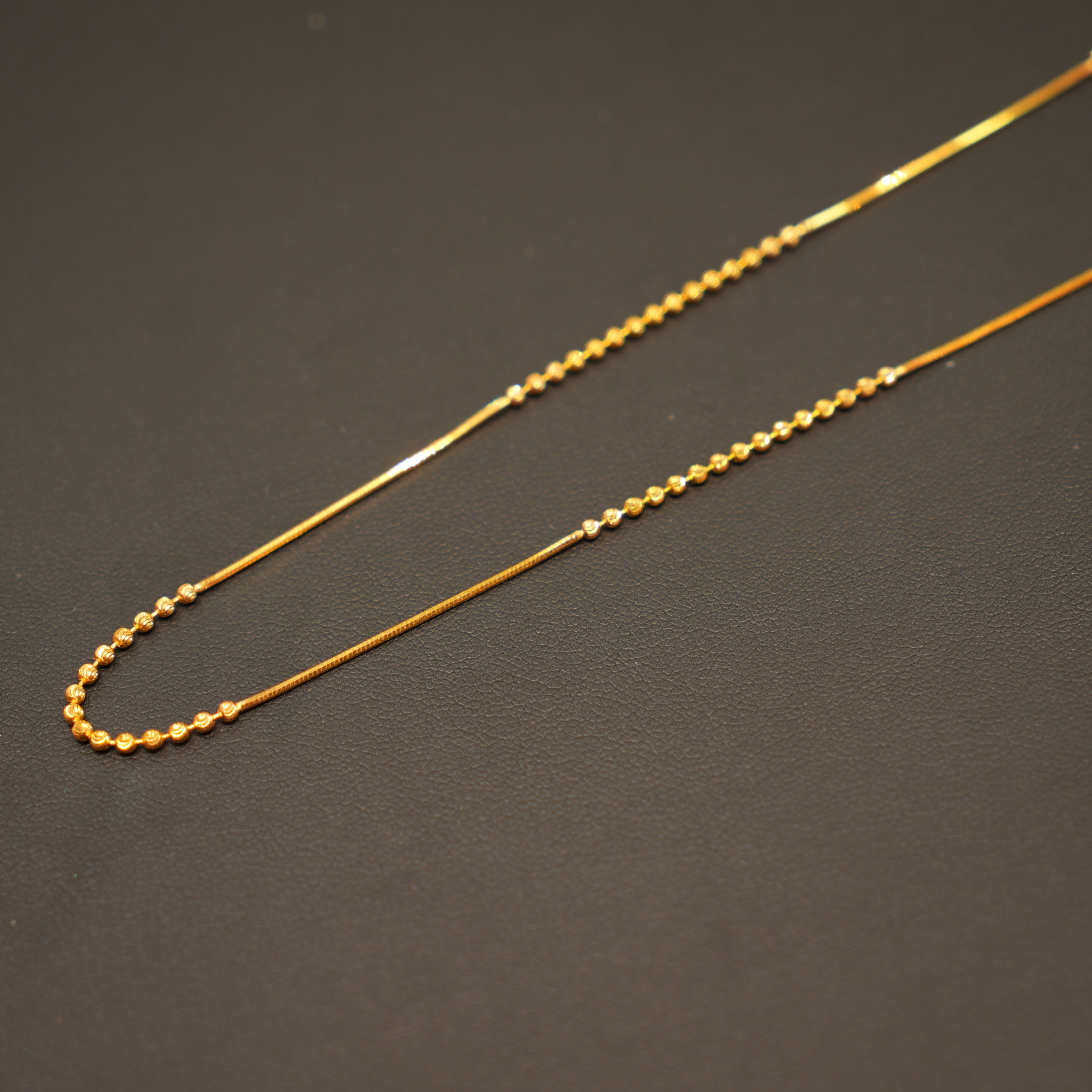 Elegant gold necklace with sparkling stones