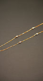 Delicate gold chain necklace with diamond accents