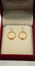 Stylish round earrings in pure gold