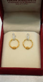 Stylish round earrings in pure gold