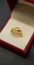 Front view of 22K gold ring with polished detailing
