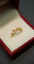 Close-up of handcrafted 22K gold ring design