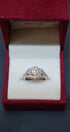Diamond Rings showcasing a beautifully crafted 14K white gold ring with natural diamonds in floral clusters.