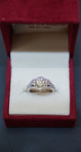 Diamond Rings showcasing a beautifully crafted 14K white gold ring with natural diamonds in floral clusters.
