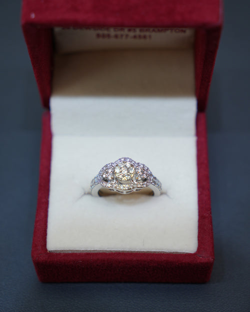 Diamond Rings showcasing a beautifully crafted 14K white gold ring with natural diamonds in floral clusters.