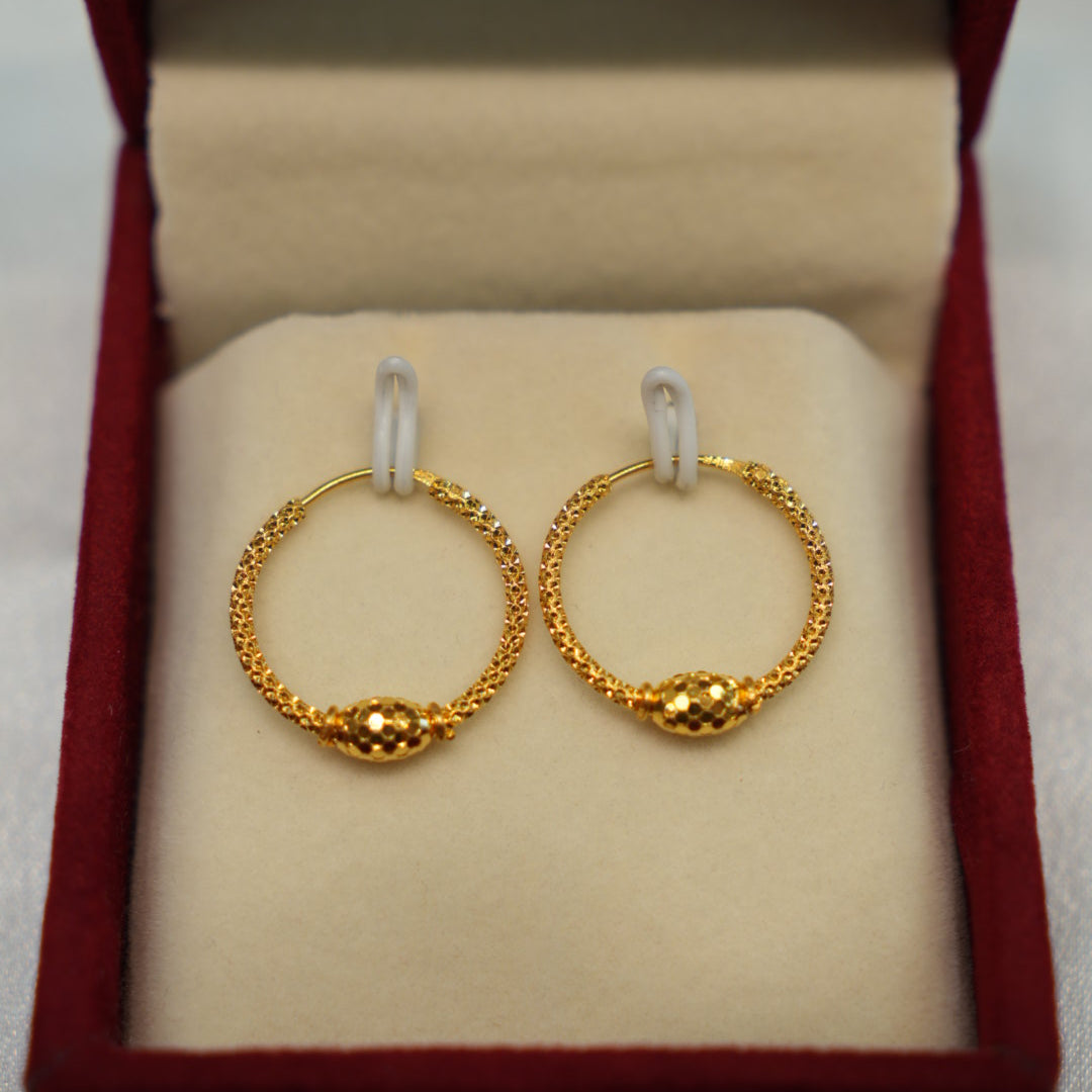 Delicate gold earrings with premium finish
