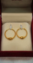 Delicate gold earrings with premium finish