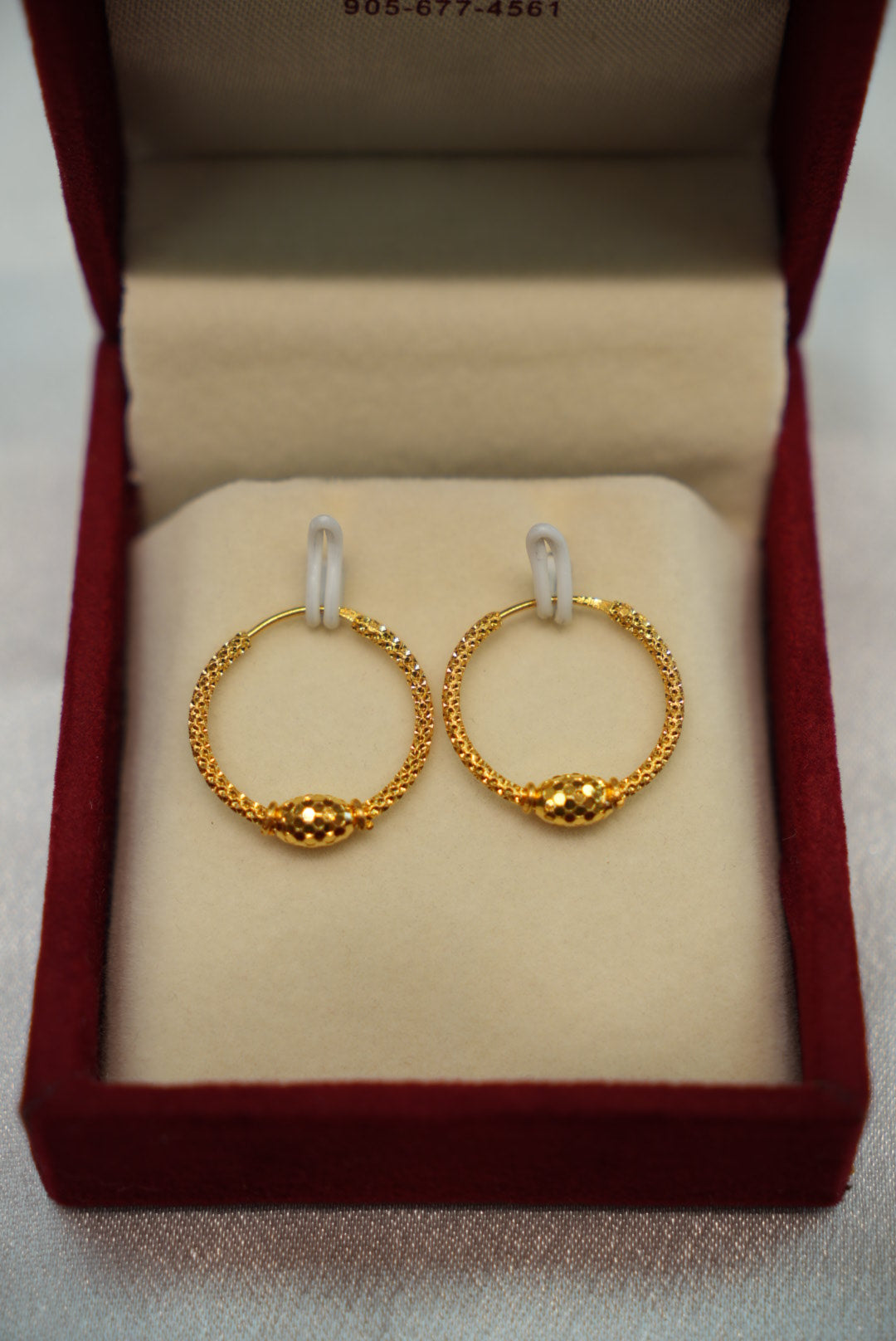 Delicate gold earrings with premium finish