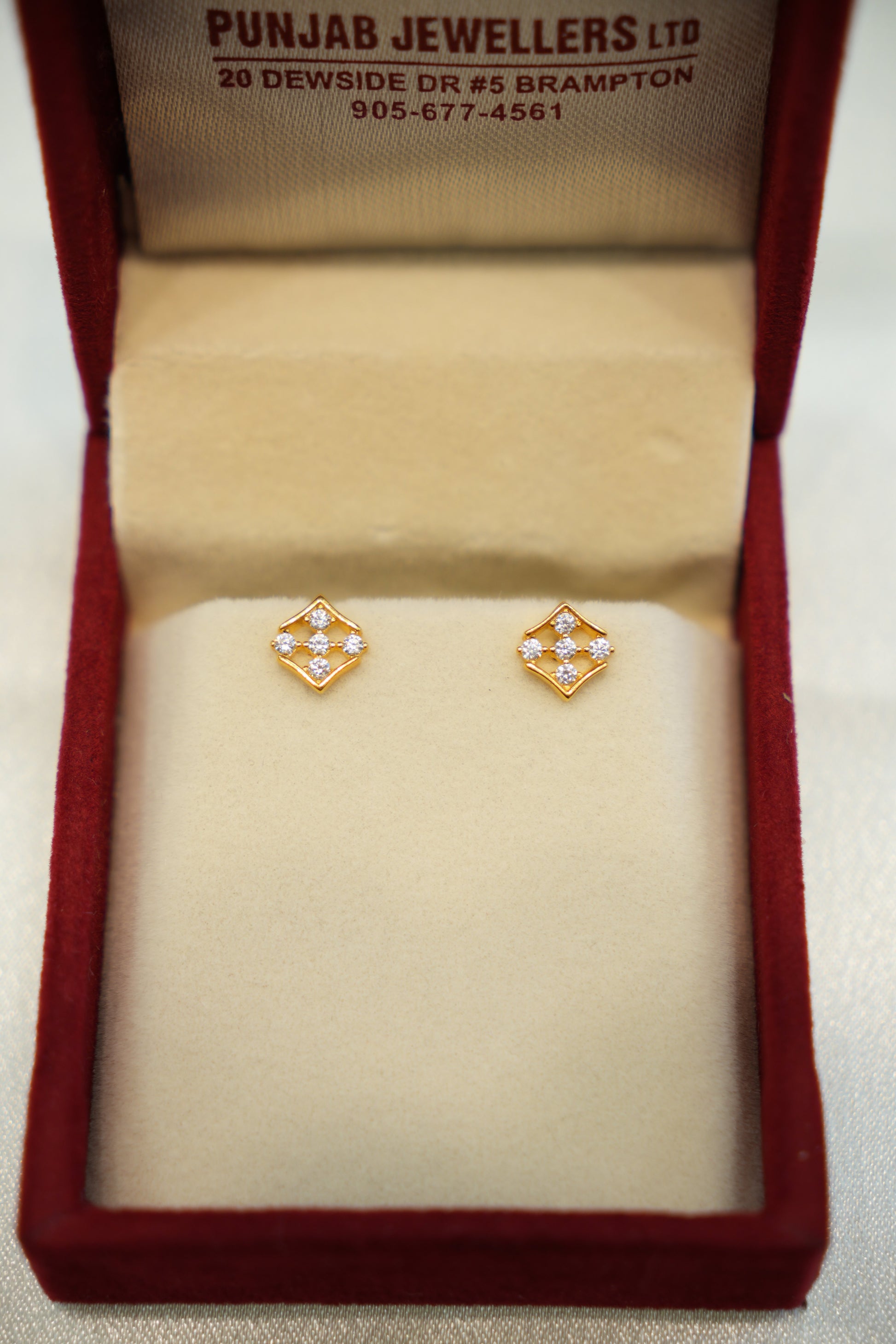Designer gold earrings for ladies