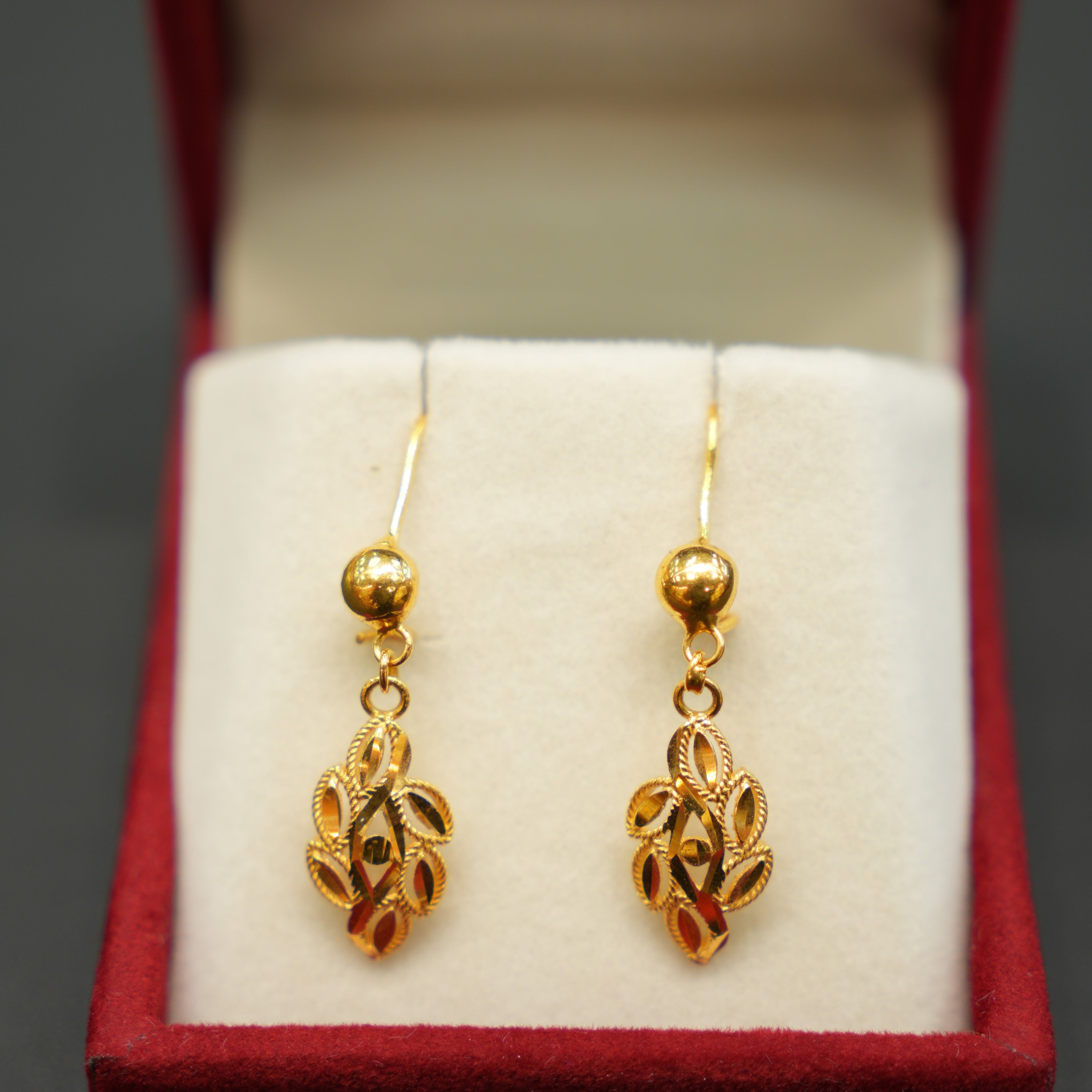 Elegant yellow gold earrings with polished finish