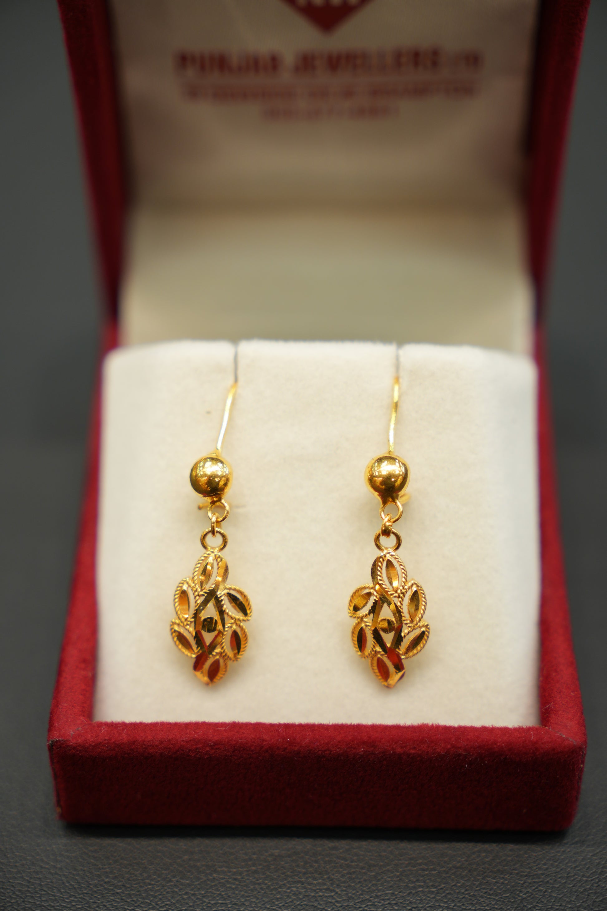 Elegant yellow gold earrings with polished finish
