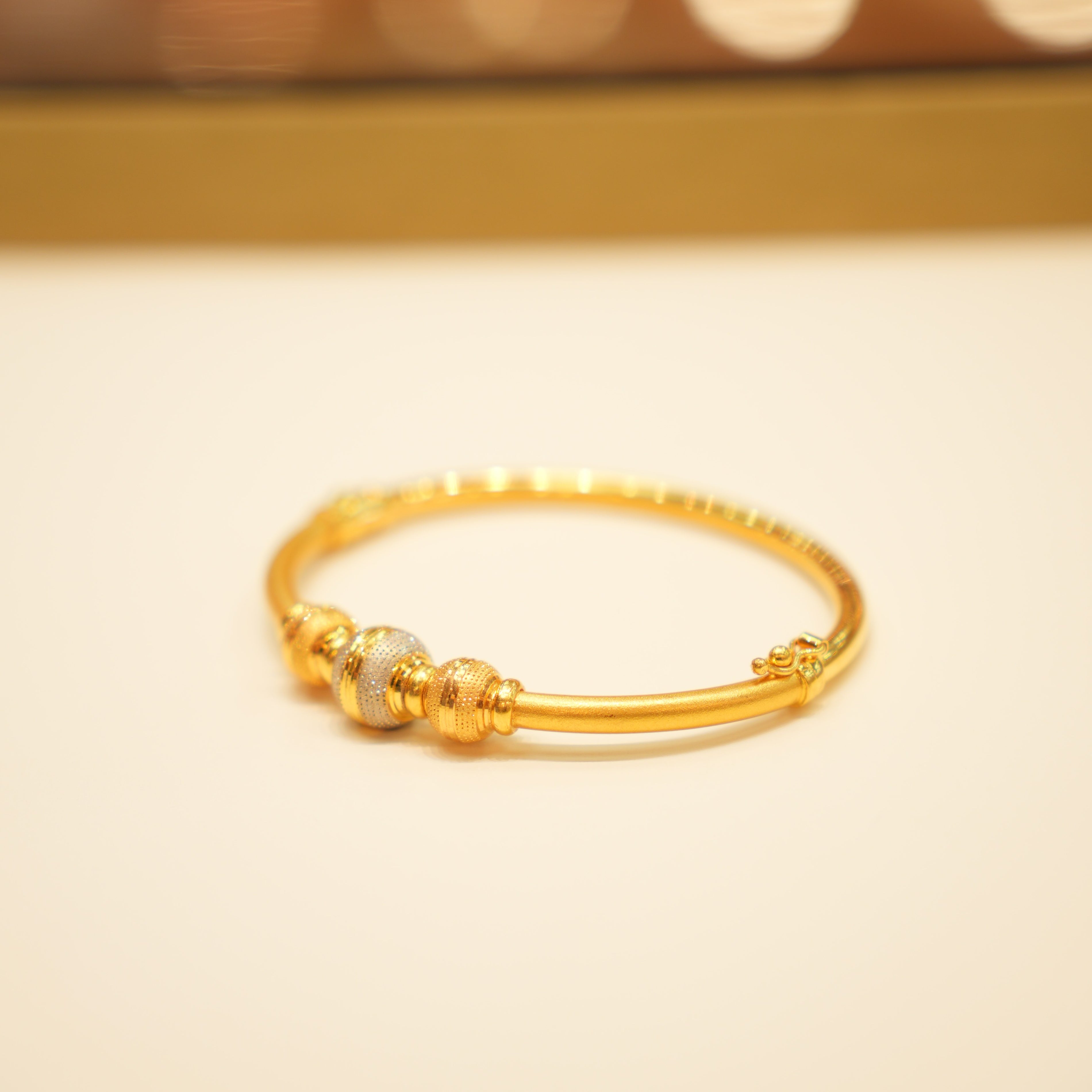 Luxury braided gold bracelet with polished shine