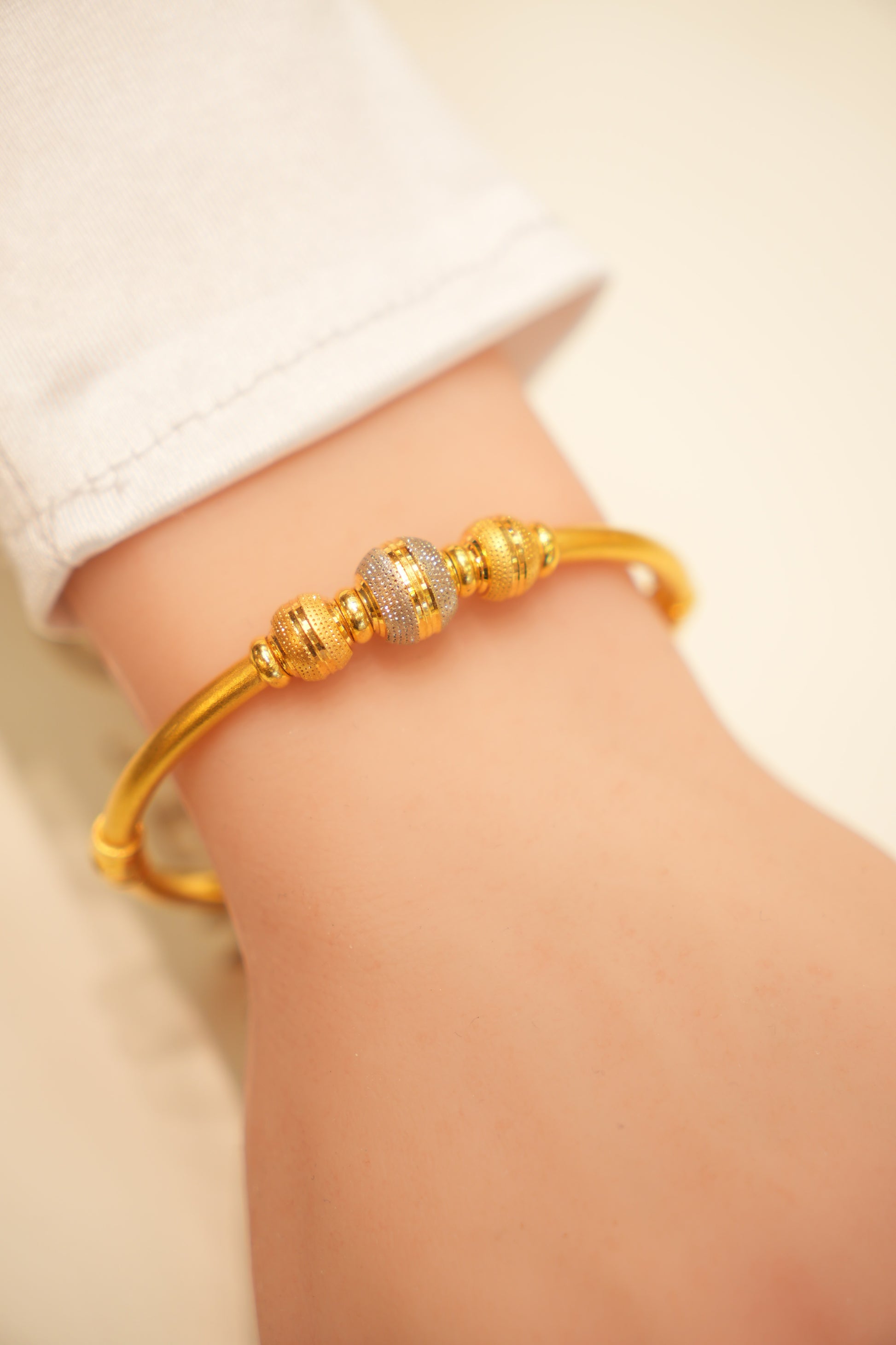 Gold bracelet with detailed craftsmanship