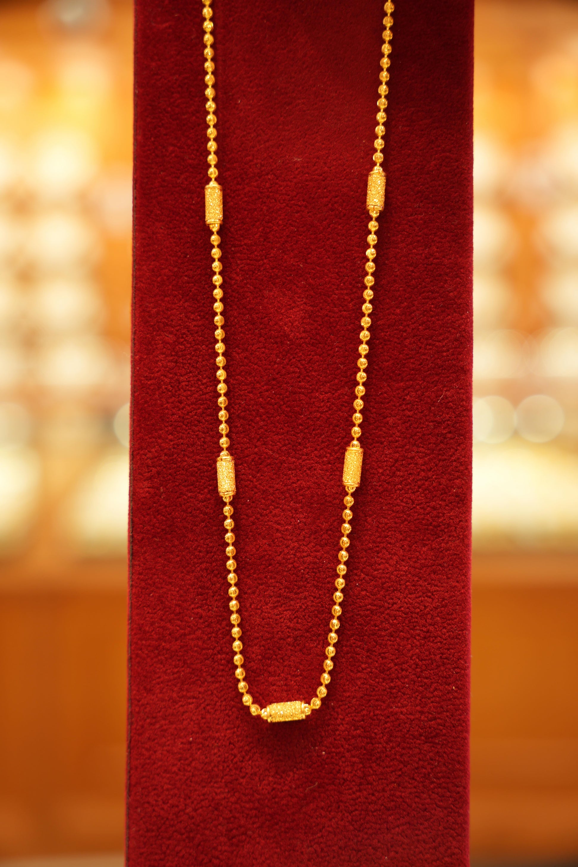 Elegant gold beaded chain