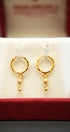 22K gold hoop earrings with a luxurious finish
