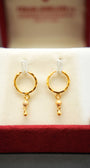 22K gold hoop earrings with a luxurious finish