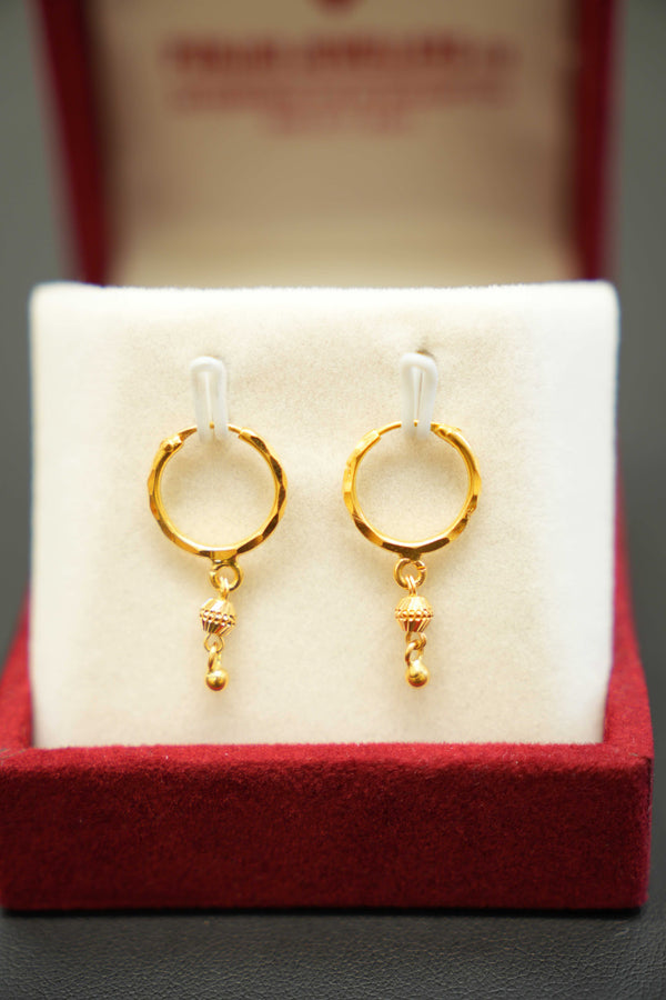 22K gold hoop earrings with a luxurious finish