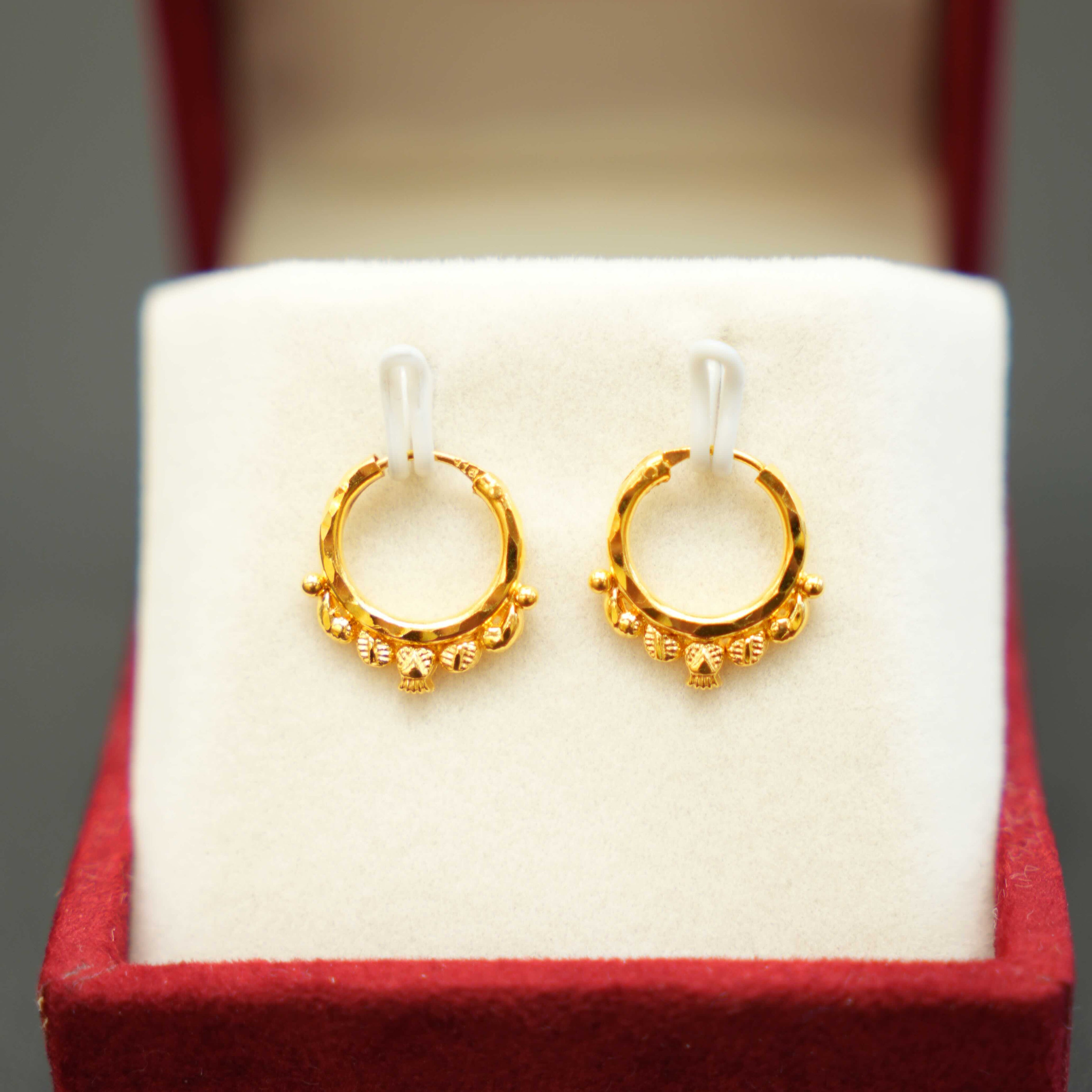 Traditional ladies gold earrings