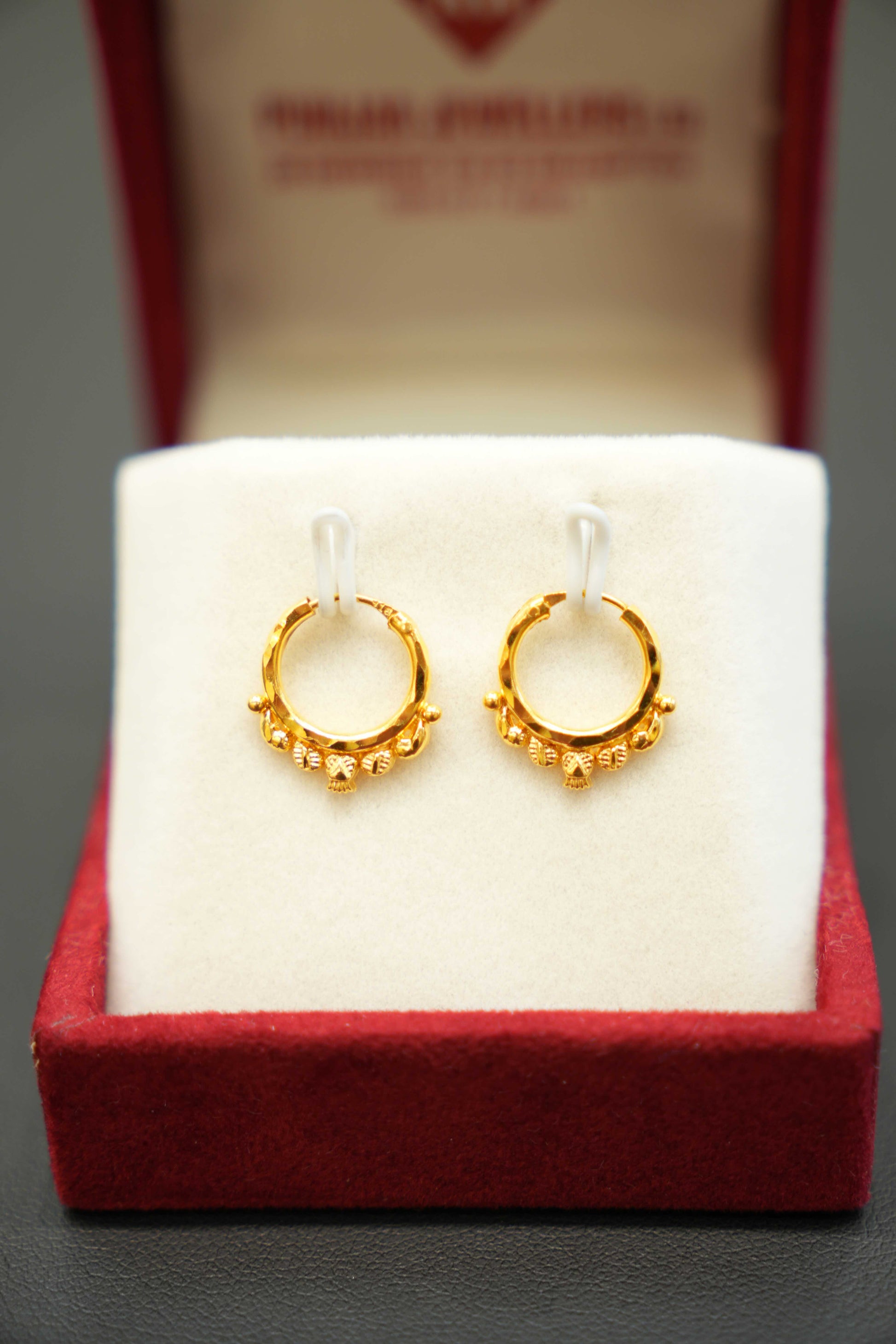 Traditional ladies gold earrings