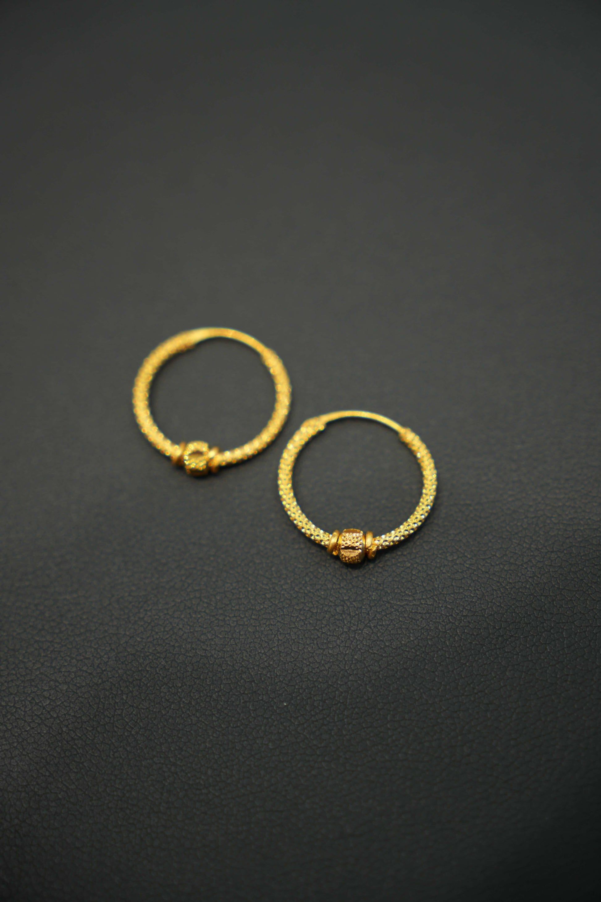 Shiny 22K yellow gold hoop earrings