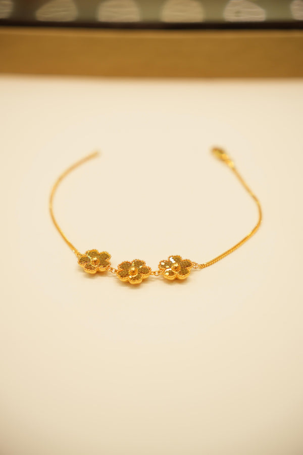 Women's gold floral chain bracelet