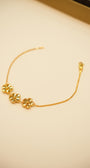 Elegant gold flower charm bracelet