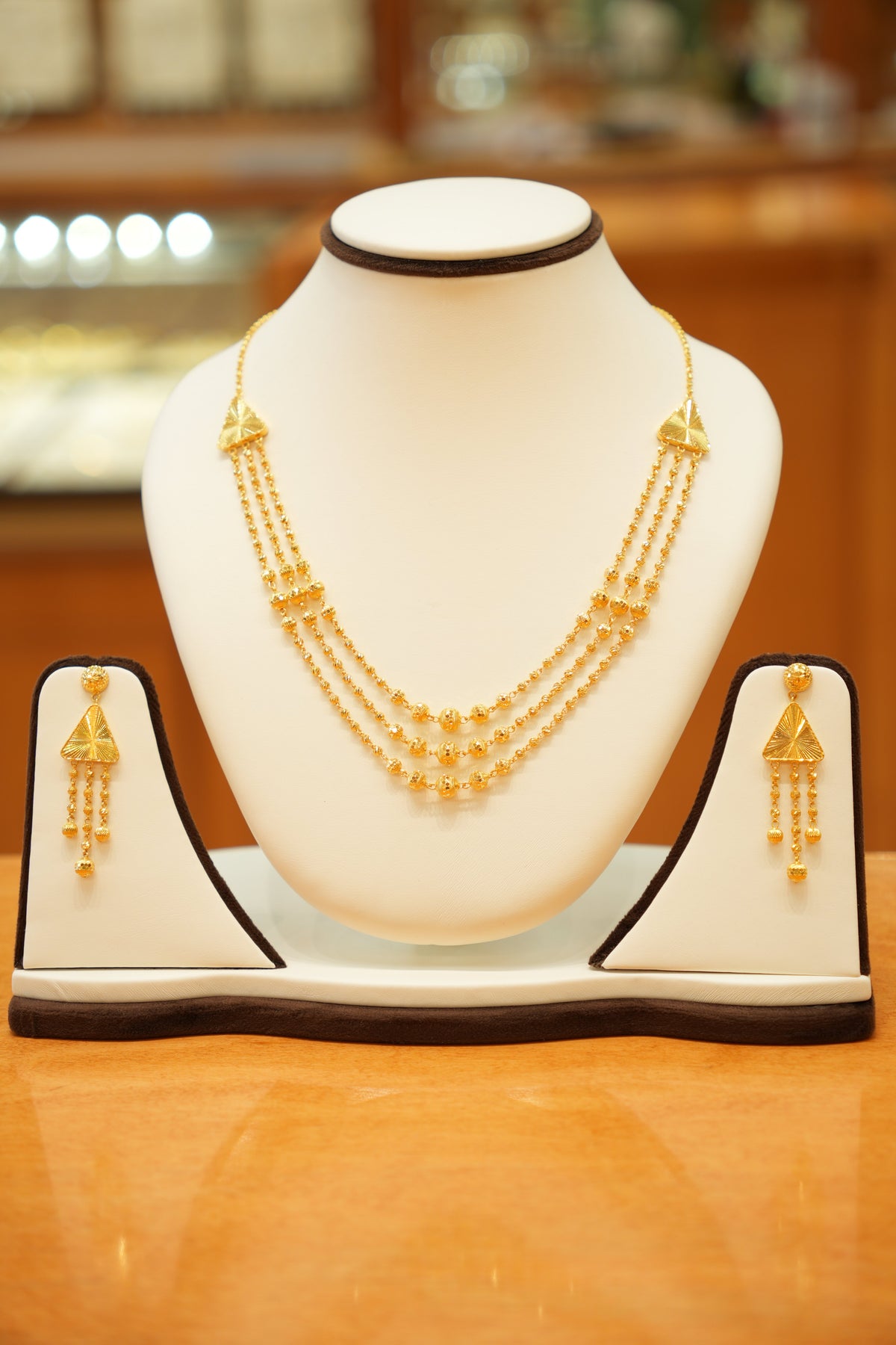 22K Gold Designer Triple String Bead Necklace Set with Hanging Earrings