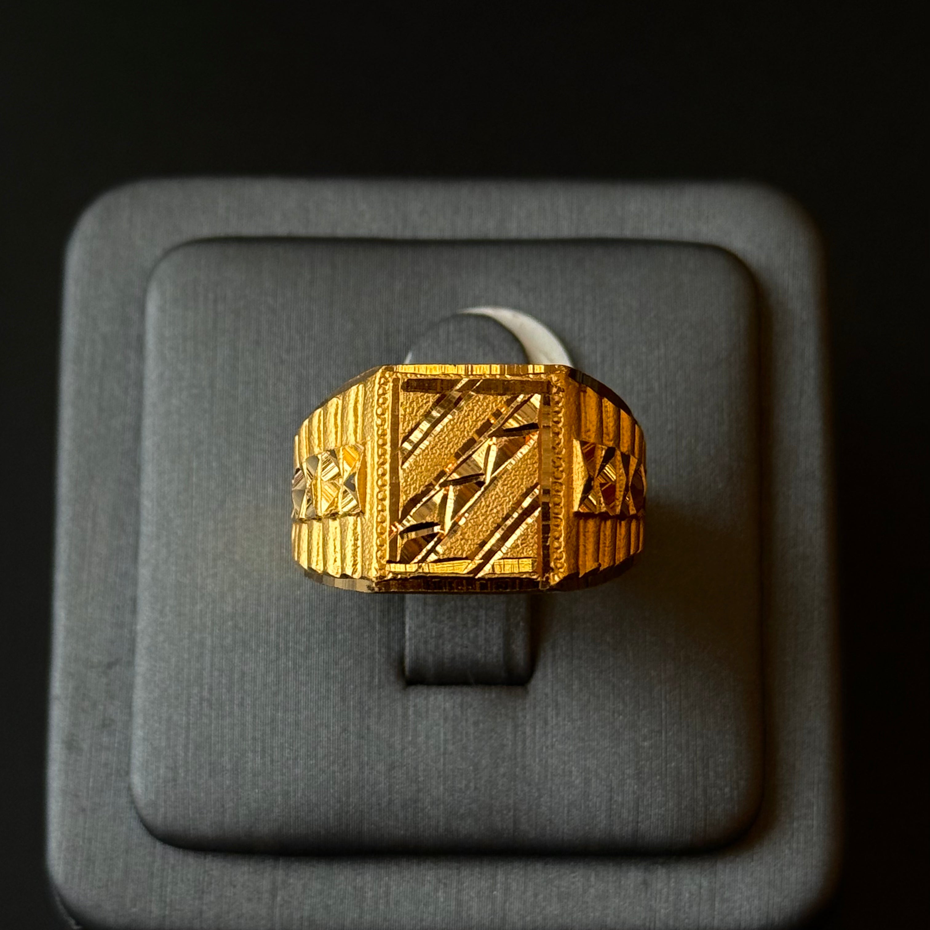 Modern gold ring with angular design