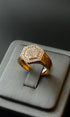 Gold ring featuring starburst design