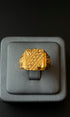 Handmade gold ring with detailed texture