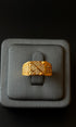 Traditional gold ring with geometric pattern