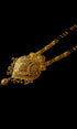 Gold necklace with black beads