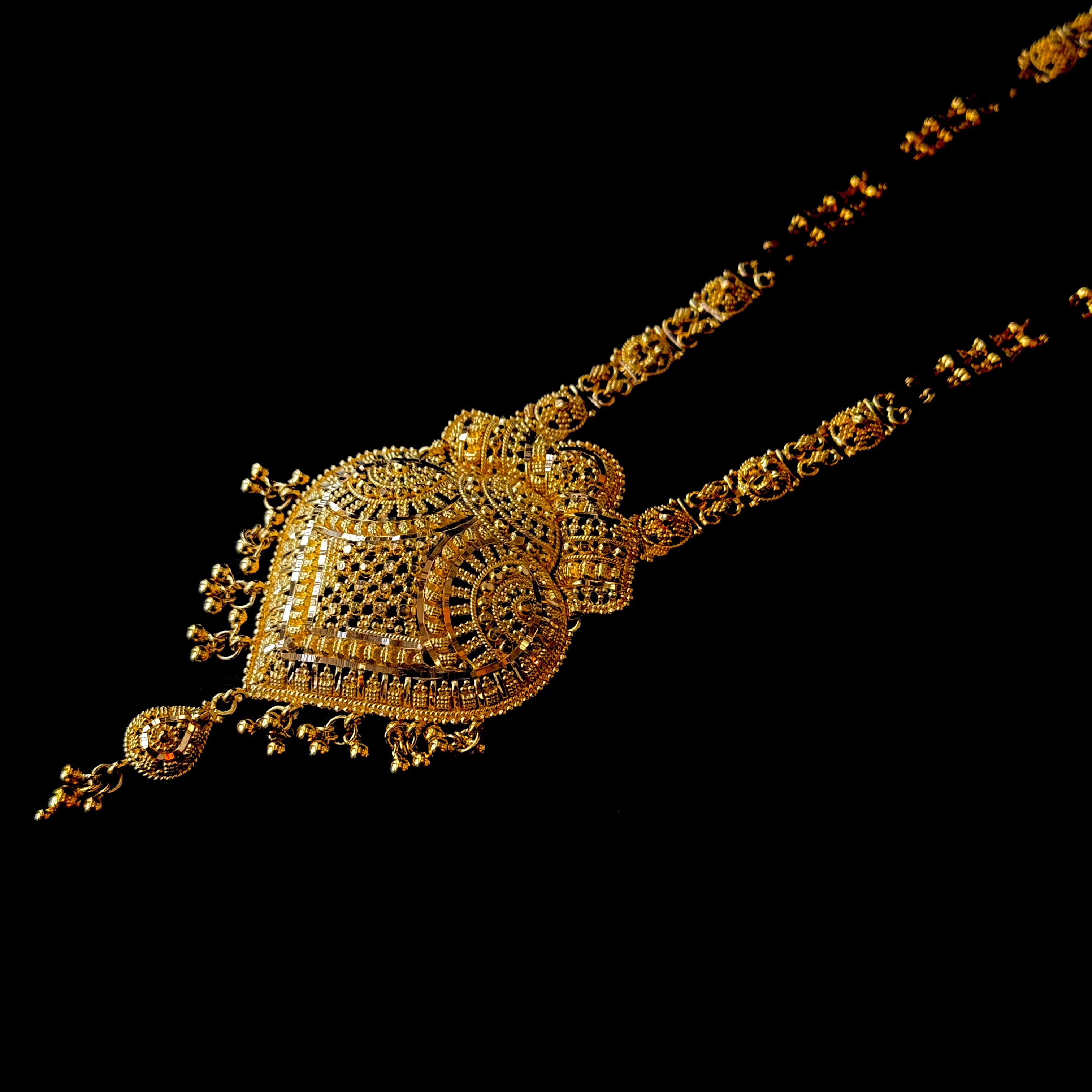 Gold necklace with black beads